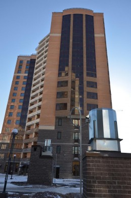 Спортивно-оздоровительный комплекс и жилой комплекс со встроенно-пристроенными помещениями и пристроенными гаражами-стоянками по адресу Калининский р-н, ул. Бутлерова д. 11, к. 3